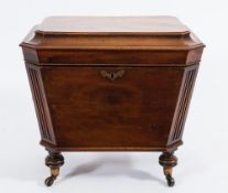 A Regency mahogany cellarette:, of sarcophagus shape,