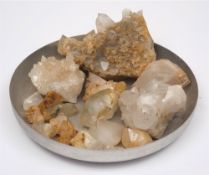 A collection of various examples of quartz crystal from Oman.