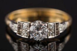 An 18ct gold,platinum and diamond solitaire ring: circa 1945,