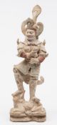 A Chinese painted pottery tomb guardian figure,