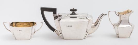 An Edward VII batchelor's silver three-piece tea service, maker William Hutton & Sons, Sheffield,