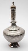 A traditional Persian silver plated vase and stopper: of squat ovoid form with slender knopped neck,