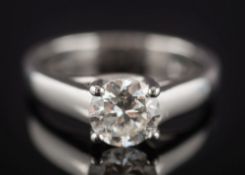 A platinum and diamond single-stone ring: with round old brilliant-cut diamond approximately 6.