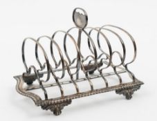 A George IV silver six-division toast rack, maker Crispin Fuller, London,