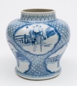 A Chinese blue and white jar: of baluster form painted with lotus shaped panels of scholars and