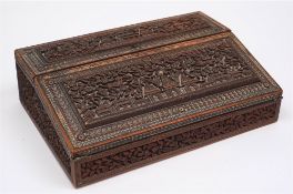 An Indian carved hardwood writing slope: bordered with mother-of-pearl inlay,