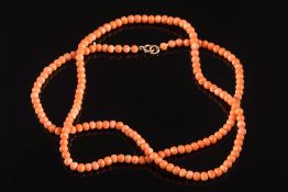 A coral bead single-string necklace: each coral bead approximately 5mm diameter,