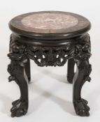 A similar Chinese carved hardwood circular jardiniere stand:, with plain circular top,