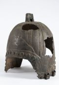 A Chinese bronze helmet in Zhou Dynasty style: with ribbed and 'rivet' detailing and pierced