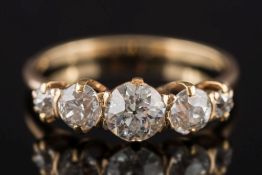 A gold and diamond five-stone ring: with graduated circular,