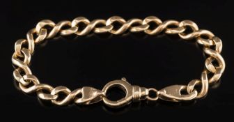 A 9ct gold curb-link bracelet: approximately 19cm long including clasp, 21gms gross weight.