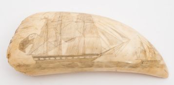 A Scrimshaw decorated tooth:, one side incised with two vessels at full sail,