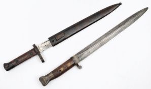 An 1881 pattern Lee Enfield bayonet stamped '92, together with a German Ersatz bayonet in scabbard:.