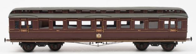 A good scratch built First Class passenger carriage in LMS livery:,gold coach lines on maroon body,