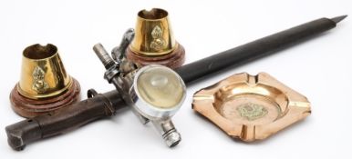 A British 1907 pattern bayonet, a pair of trench art ashtrays, one other ashtray and an optic:.