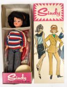 A 'Sindy in Weekenders' doll in original box by Pedigree:, together with stand,