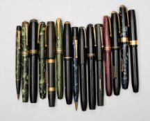Fourteen various Conway Stewart fountain pens and a green marbled 'Nippy' No.2 propelling pencil:.