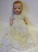 An Armand Marseille bisque head doll: impressed AM. Germany. 351/7K.