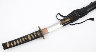 A Japanese katana:, the blade over a gilt highlighted dragon decorated piercework tsuba,