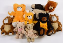 A collection of assorted teddy bears:, including Gorgio black bear, Koala and other teddy bears.