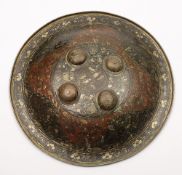 A 19th century Indo-Persian Dhal:, with red and black floral decoration, 38cm diameter.