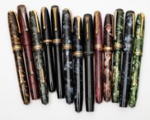 Thirteen Conway Stewart fountain pens:, including a blue marbled '58', and a brown marbled '84'.