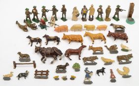 A collection of farm animals and military figures by Britains,Dinky and other makers:,