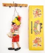 A Pelham puppet 'Pinocchio' in original box:, dated 1962.