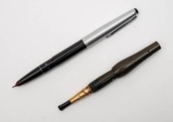 A Montblanc 'Monte Rosa' fountain pen and a Dunhill cigarette holder:,