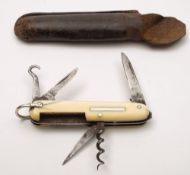 An ivory mounted pen knife by G Butler, Sheffield:, with six various blades and attachments,