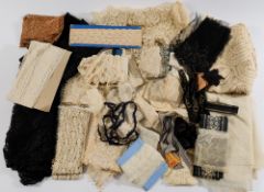 A quantity of various 19th century and later white and black lace trim, edging and panels:.