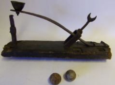 A 19th century Knur & Spell ball game: the oak rectangular platform with tensioned steel spring,