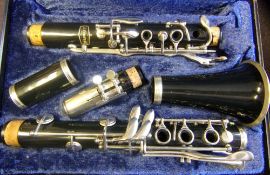 A Bundy five section clarinet : contained in a fitted carrying case.