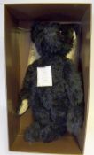 A Steiff 'British Collector's 1912 Replica Teddy Bear' Ltd. Ed: in black plush, 49cm. high, boxed.