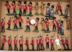 A Britains Guardsman band set and a collection of various guardsman figures:, various makers,