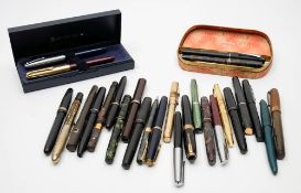A collection of various fountain pens:, various makers including Sumit, Sheaffer,