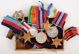 Nine various WWII General Service Medals together with a collection of ribbons,