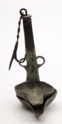 A steel oil lamp in the antiquarian style:.