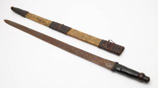 A late 19th century Omani Arab sword kattara:, the broad double edged blade with triple fuller,