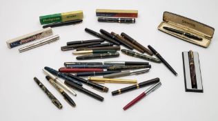 A collection of various fountain pens:, including a green marbled pen by Croxley,