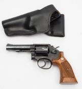 A deactivated Smith & Wesson .38 special revolver :, number 5D45034.