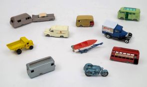 A small group of Matchbox vehicles including a Lomas Ambulance and a Volkswagen Caravette:.