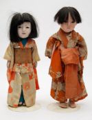 A pair of early 20th century Japanese dolls:,