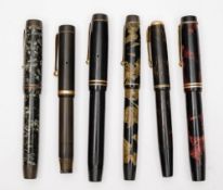 A Parker 'Duofold' in lined silver and green, another in black and burgundy,