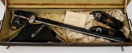 An early 20th century court sword together with a bicorn hat,