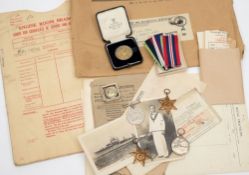 A WWII Royal Navy group of four to L Stoker WA Moore:, together with service papers ,