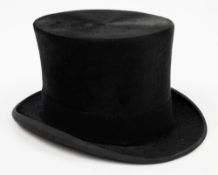 A black felt top hat by Christys London for Austin Reed:.