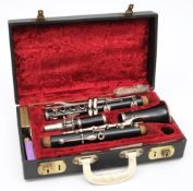 A 20th century English clarinet:, numbered 256818 with silver plated keys, in a fitted case.