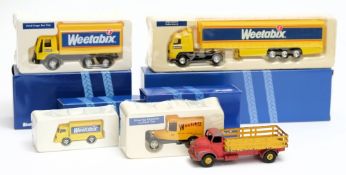A Dinky Leyland Comet flatbed lorry together with four Corgi Classic lorries in 'Weetabix' livery:.