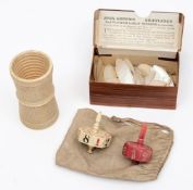 A pair of 19th century ivory dice cups,